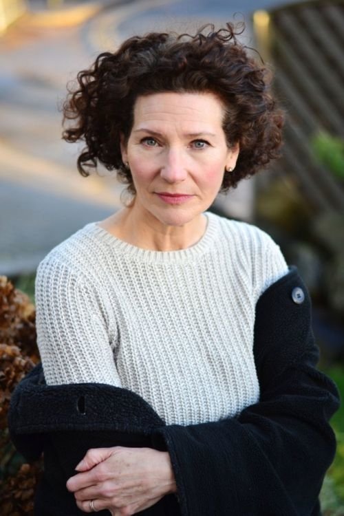 Holly Hayes as Lady at Bookstore