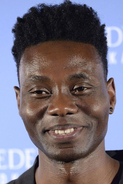 Olugbenga Adelekan as Self : : Vocal & Bass