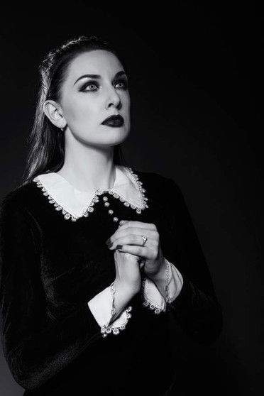 Sorcha Real as Secretary