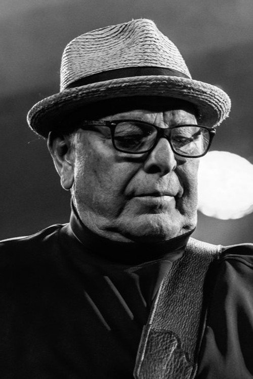 Conrad Lozano as Bass, Guitaron, Backing Vocals