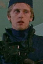 John Rice as Officer in Project Apt.