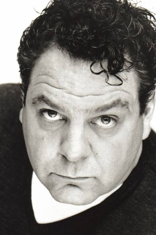 Sam Douglas as Man At Kissing Booth