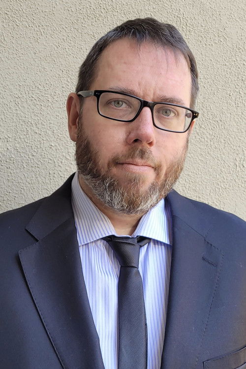 Ryan Stockstad as Townsperson (uncredited)