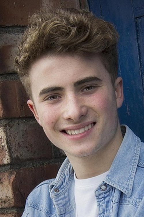 Bretten Lord as Tom Proctor