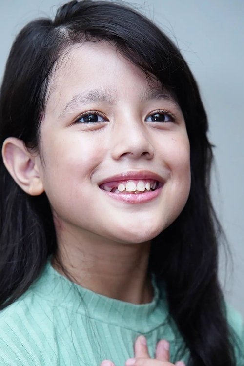 Azkya Mahira as Little Komang