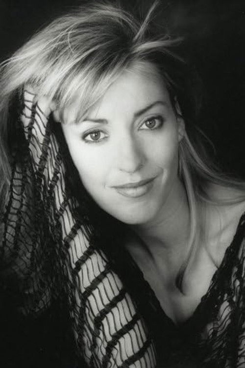 Mireille Fournier as Photographer