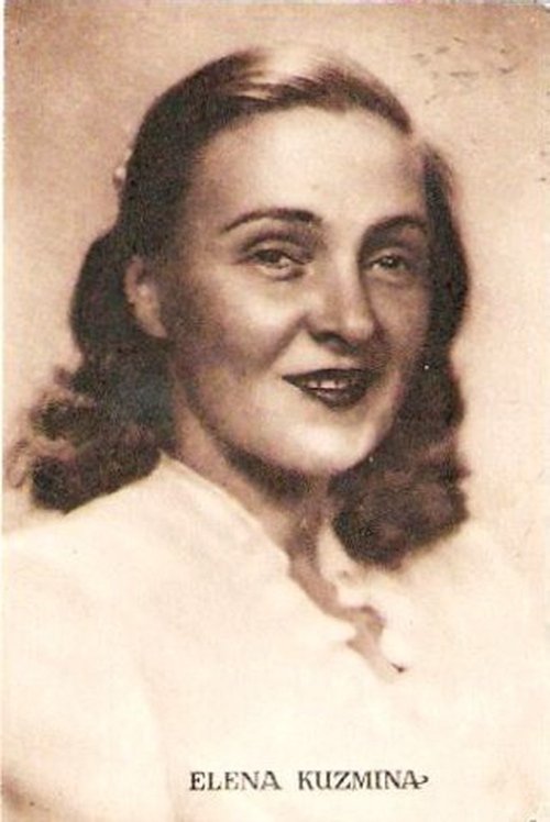 Yelena Kuzmina as Louise Poirier, the shop-assistant