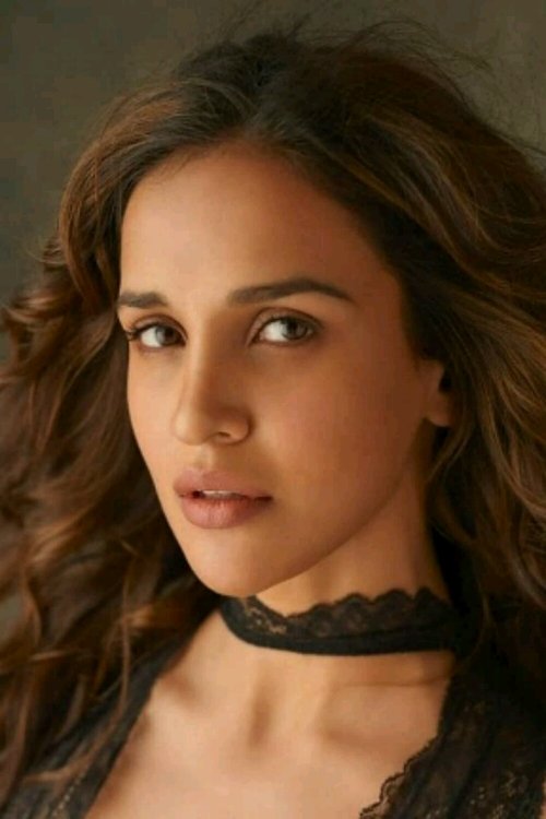 Aisha Sharma as 
