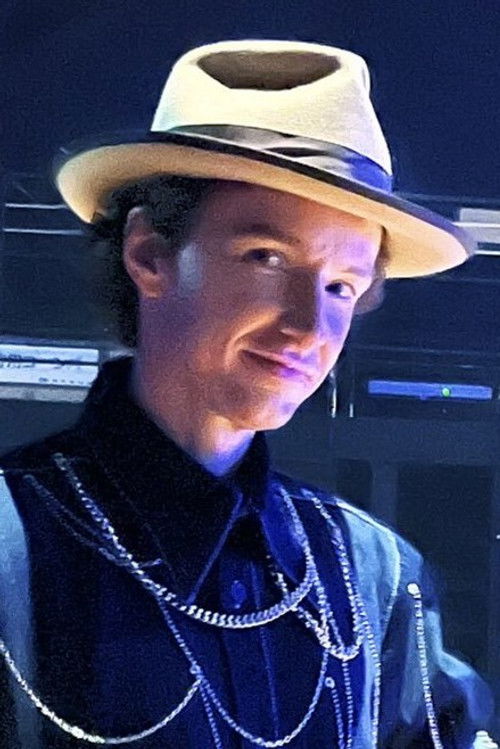 Benjamin Anderson as 