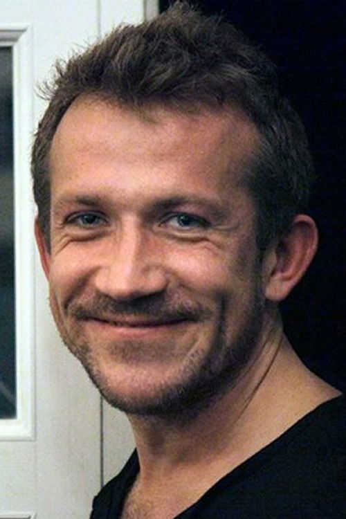 Viktor Melnikov as Russian TV Dubber (voice)