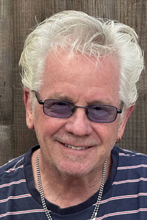 Johnny Colla as Self - Guitars, Saxophone, Percussion, Vocals