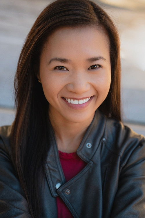 Nhan Le as Megaphone Protestor