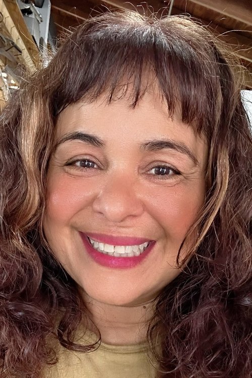 Anamín Santiago as Mrs. Báez