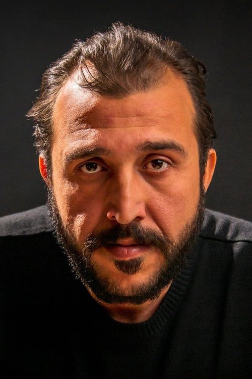 Majd Eid as Photographer