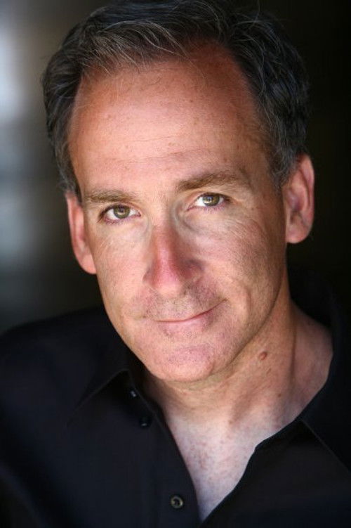 Gregory George Frank as Office Worker