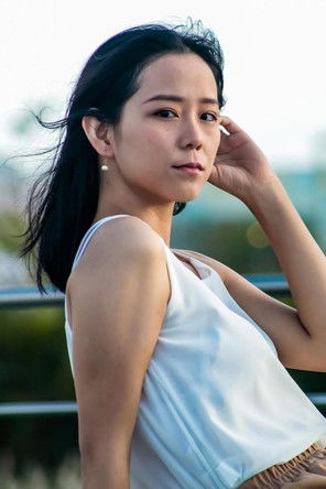 Becky Zhu Wu as Adela Cheng