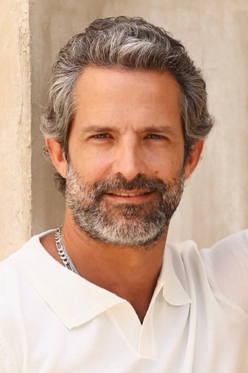 Iran Malfitano as Carlito / Camachito