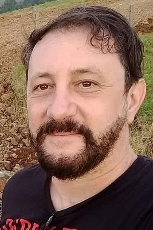 E.B. Toniolli as Técnico das Empresas Cronenberg 1