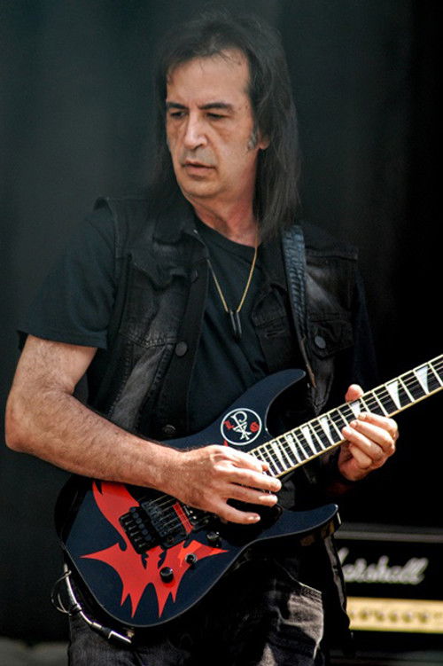 William J Tsamis as Guitars