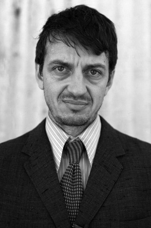 Dave Vescio as Damien Michaels