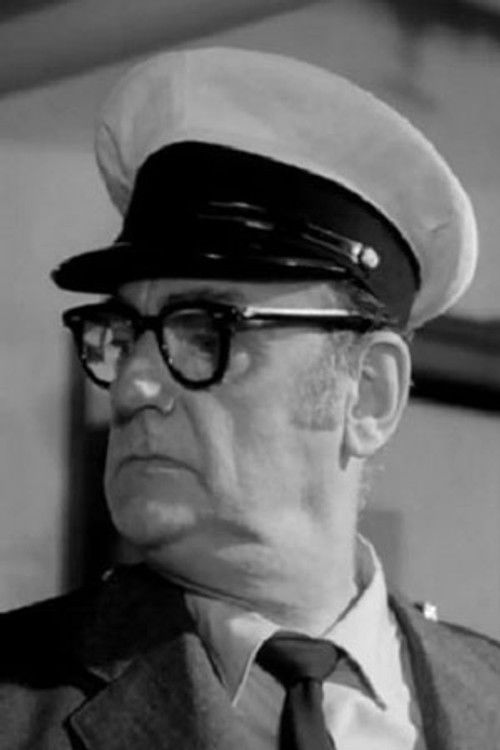 J. Léo Gagnon as The Grocer