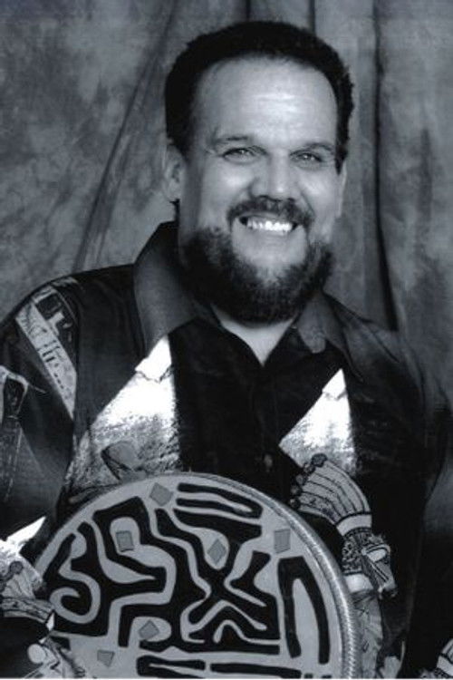 Manolo Badrena as Percussion