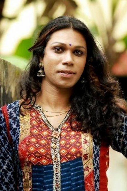 Sheethal Shyam as Traveler seat #1W Gandhi travels.