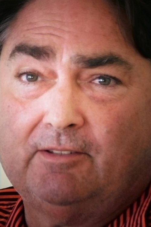 Andrew Mullen as The Car Owner