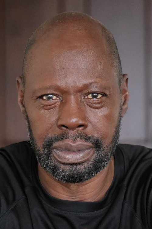 Oscar Best as Scary Nigerian Client