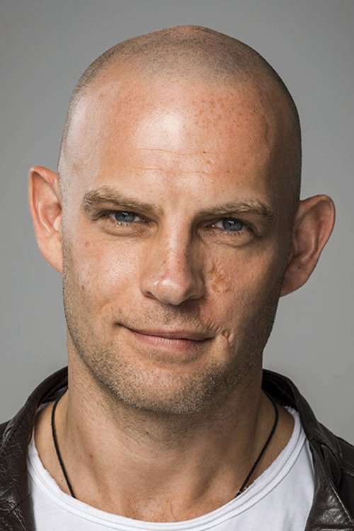 Alexey Ushakov as Suit Guy #1