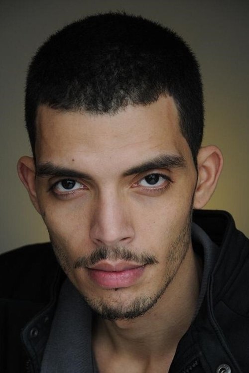 Driss Ramdi as Karim