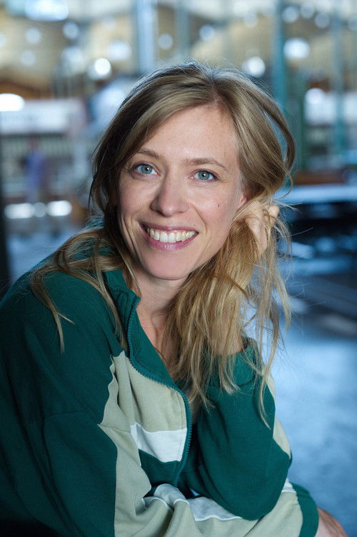 Kirstin Warnke as Lucy Komisar