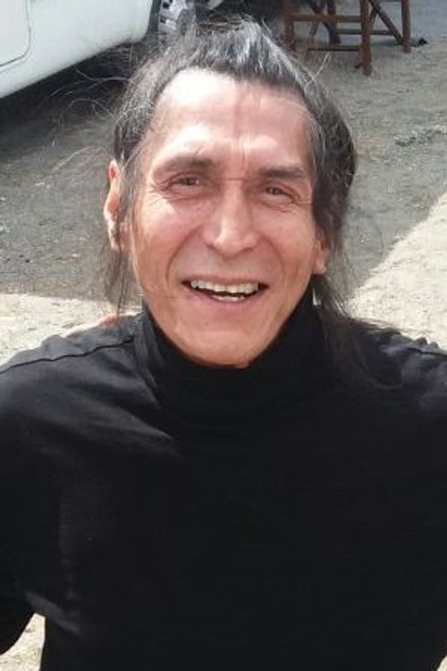 Robert Alan Packard as Shoshone Advisor #2