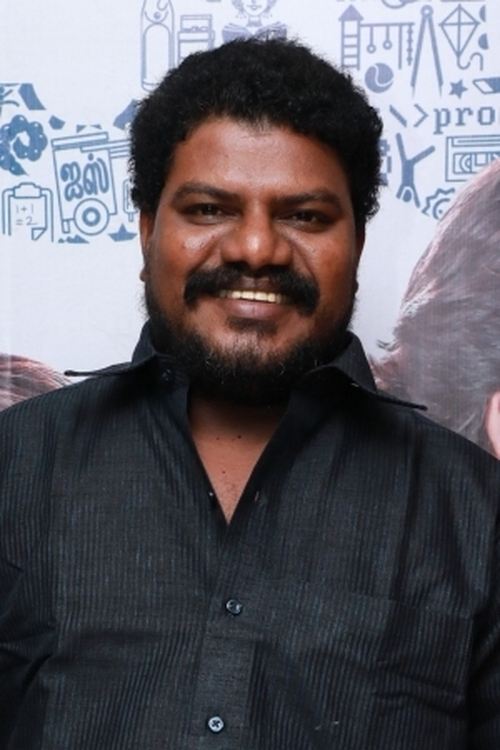 Aadukalam Murugadoss as 