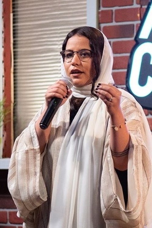 Lama Alfard as Dana's mom / TV reporter