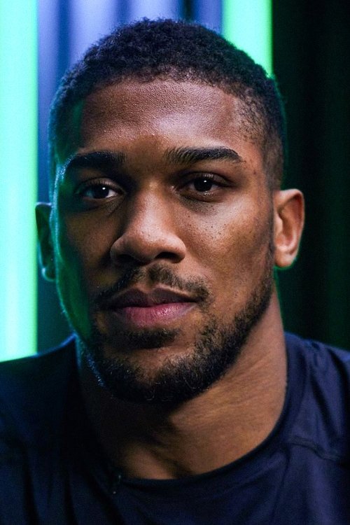 Anthony Joshua as Mic Drop Joshua