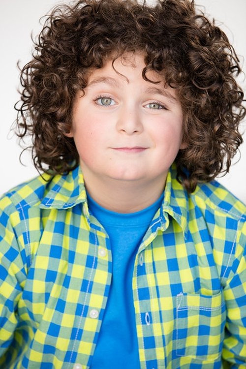 Elie Samouhi as Ensemble/Grover Dill