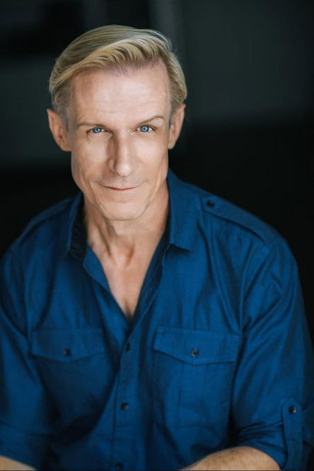 Clay St. Thomas as Coach Jim Miller