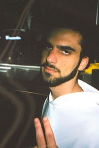 Evan Katsogiannis as Bus Stop Man #1