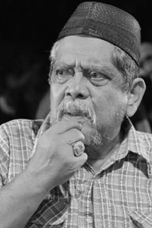 Zami Ismail as Tok Guru