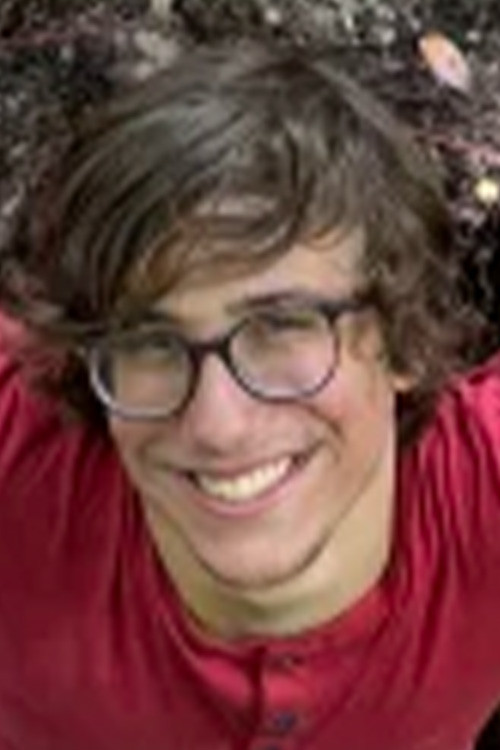 Luca Balescu as Protesting Student