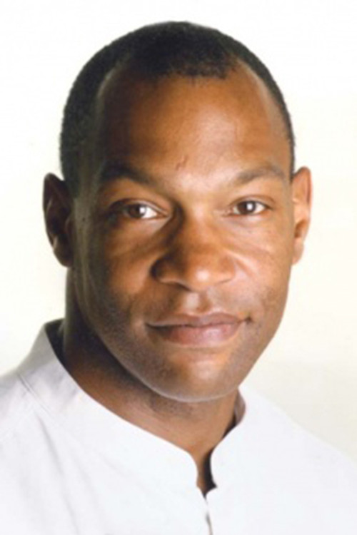 Vaughn Clements as Booking Sergeant