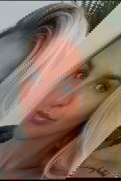 Mirabell Lundgren as Woman in the Club