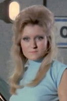 Maria Coyne as Receptionist