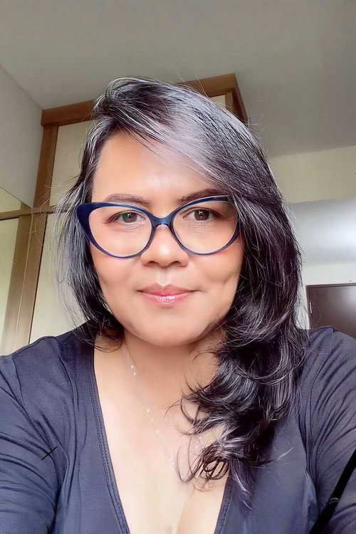 Hotma Tanjung as Mamak Oki