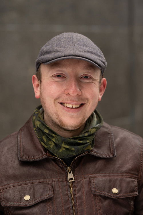 Kris Scott as Historian Patrick