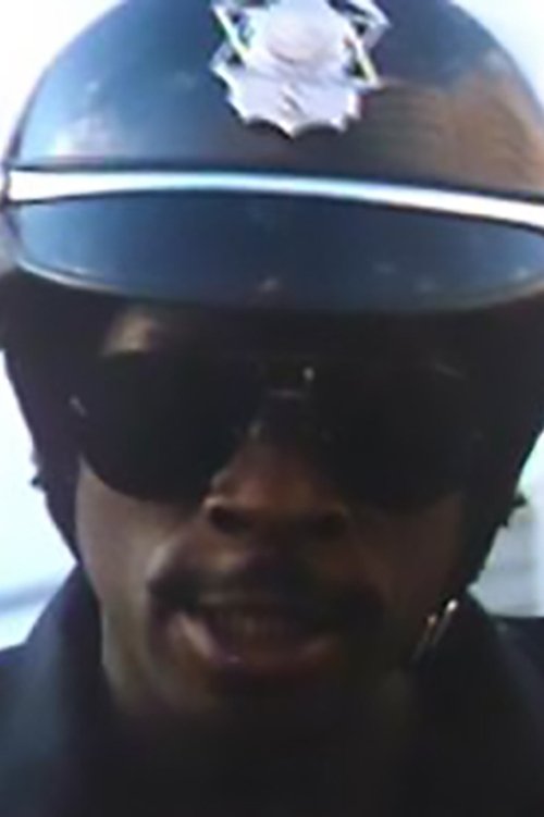 Charles P. Harris as Motorcycle Cop