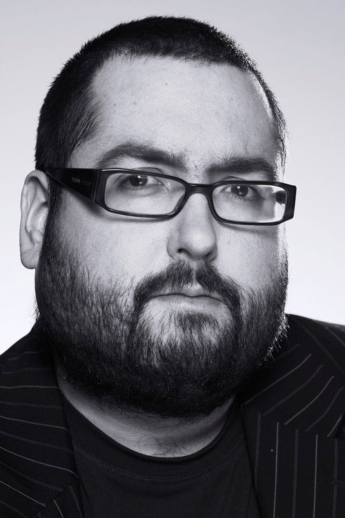 Ewen MacIntosh as DJ