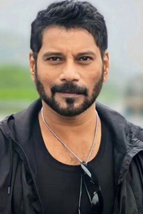 Raviraj Kande as Suresh Vichare