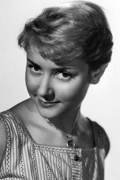 Régine Lovi as Ms Viteau, the teacher